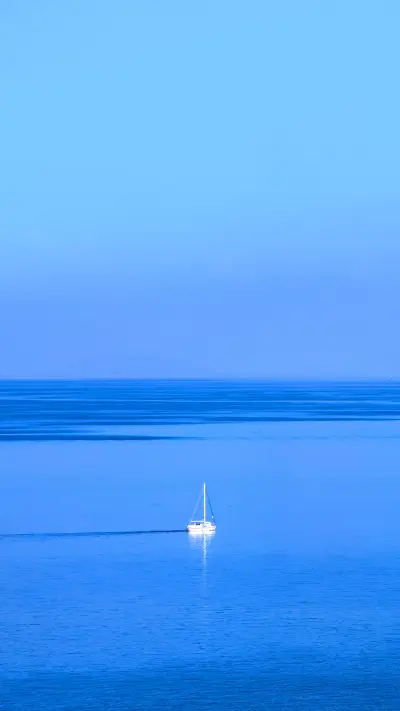 Boat sailing on the calm sea alone