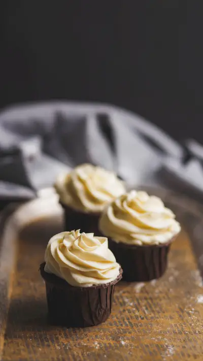 Three muffin with white powdered sugar