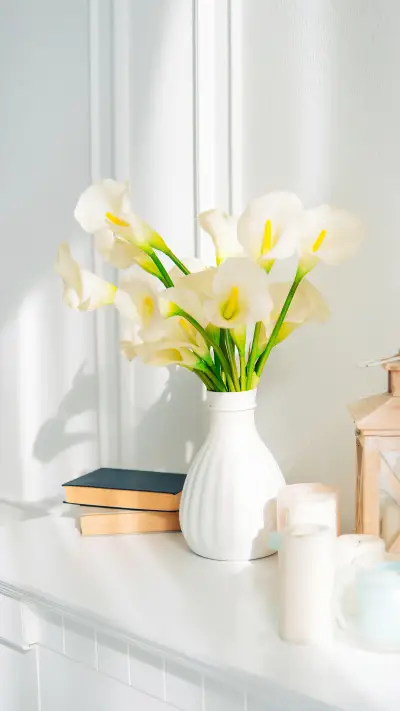 Yellow beautiful flowers on a wooden shelf