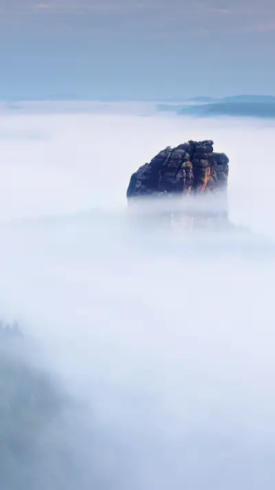 A sea of clouds on the top of the mountain