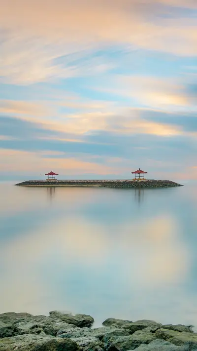 A Balinese sunrise reflected in the Indonesian sea