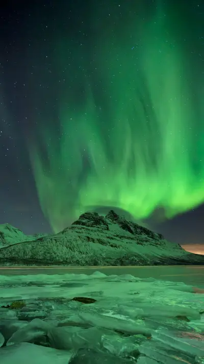 Why do geomagnetic storms bring auroras