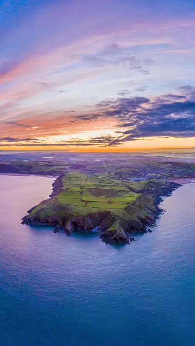 Aerial sunrise view over Baggy Point towards Woolacombe