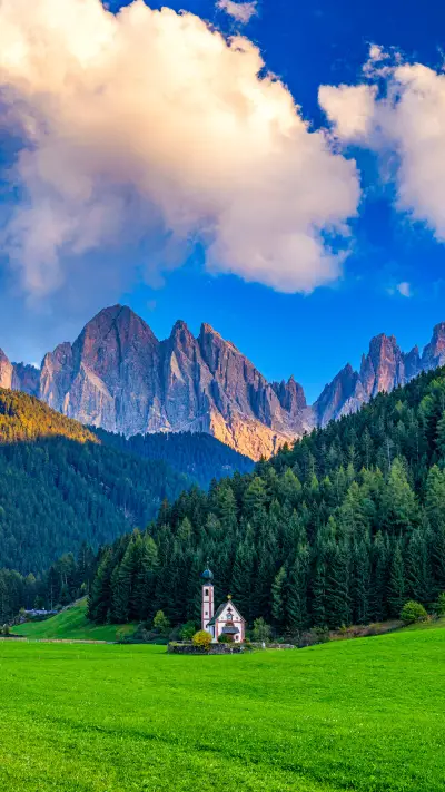 Beautiful landscape with Italian Alps and Church