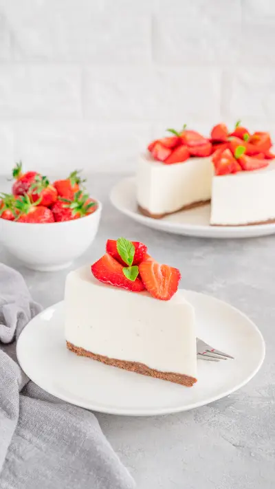 Strawberry-mint cake on a white plate