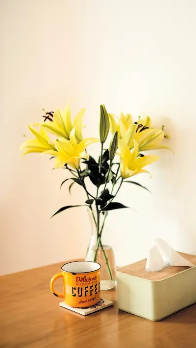 A vase of yellow lilium