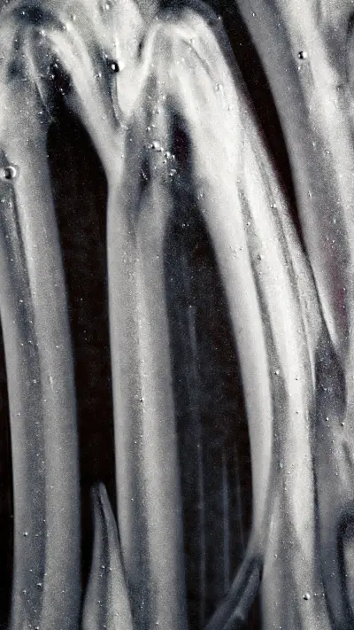 Silver liquid vortex splashing