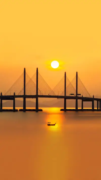 Beautiful Penang Bridge sunrise with boat view
