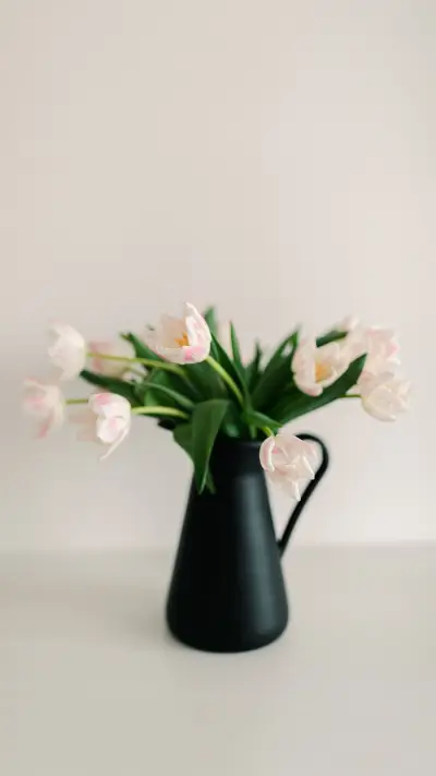 Soft white tulips on the white background