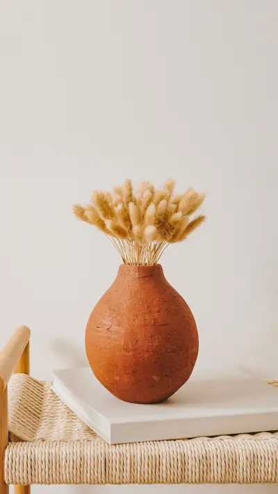 Gentle rabbit tail grass stalks bouquet in ginger clay pot